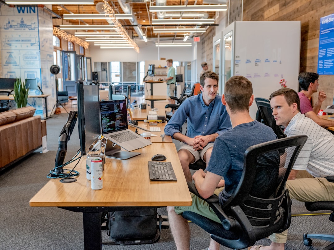Marketing team reviewing campaign performance data